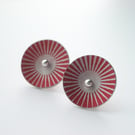 Red and silver sunburst circle studs