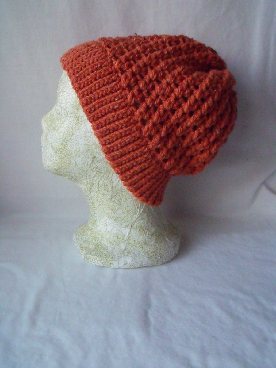 pumpkin coloured crocheted slouch beanie hat