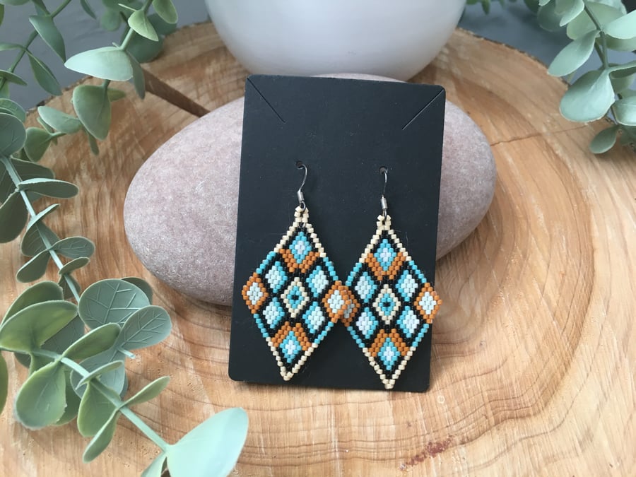 Unique hand woven beaded diamond shape dangle earrings. 