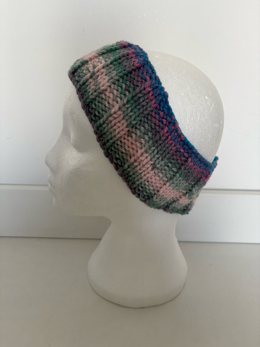 Hand knitted headband. 