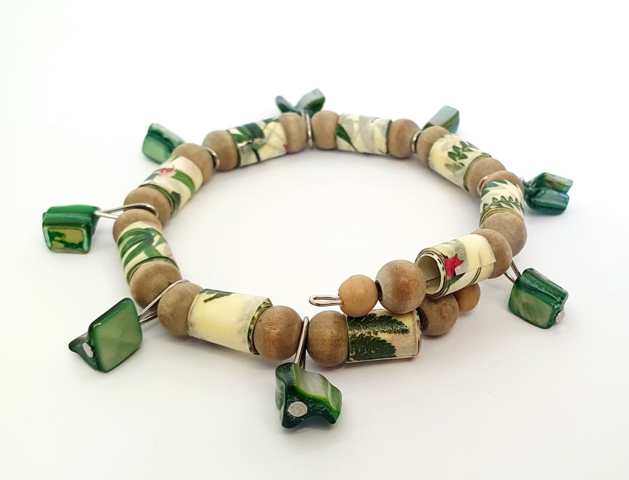Paper beaded memory wire bracelet inspired by nature