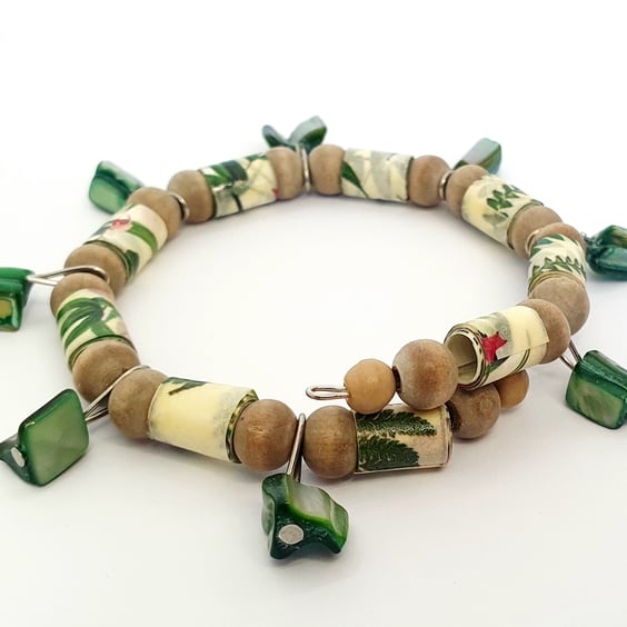 Paper beaded memory wire bracelet inspired by nature