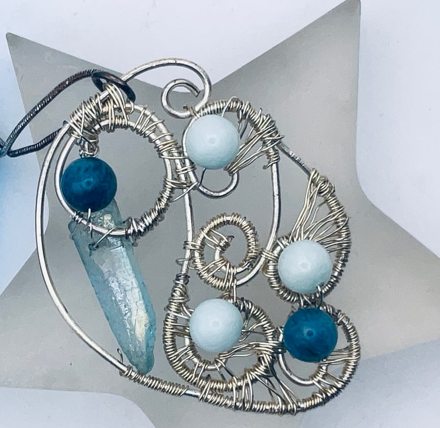 Multi amazonite and agate point  wire wrapped aqua coloured pendant.