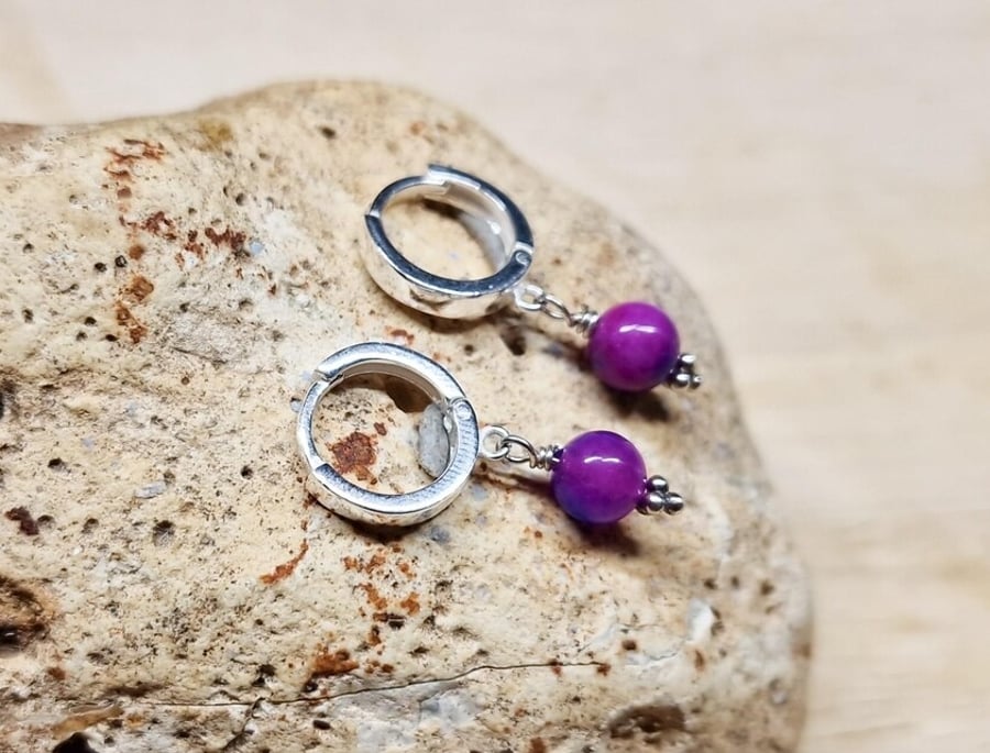 Purple sugilite huggie hoop earrings. Sterling silver