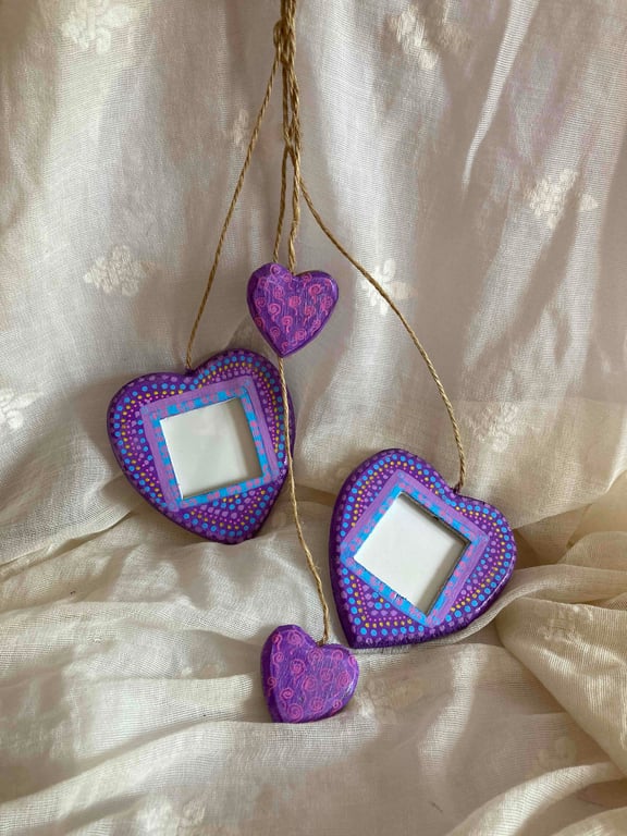 Hanging hearts with  photo frames