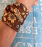 Wide fabric cuff bracelet in retro brown design - Image 7