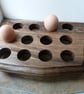 WOODEN  EGG  STAND, FOR TWELVE EGGS IN WALNUT WITH MACHINE CONTORED EDGES - Image 1