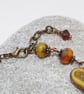 Rustic heart bracelet in red and dark yellow tones - Image 3