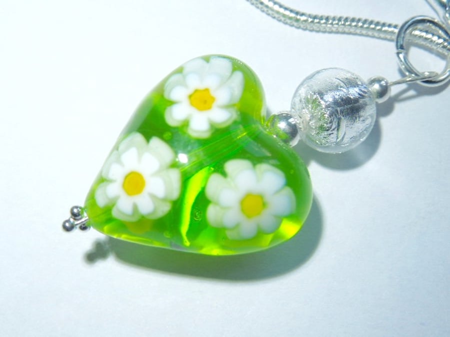 Green and white Murano glass heart pendant with sterling silver chain.