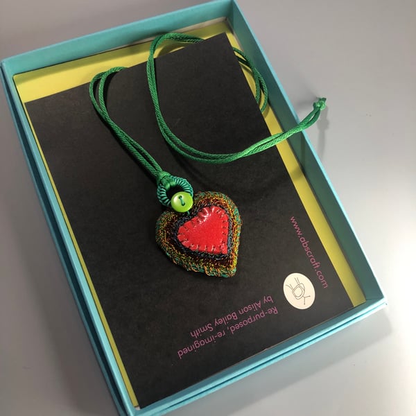 Turquoise edged red rubber and wire heart pendant from recycled materials
