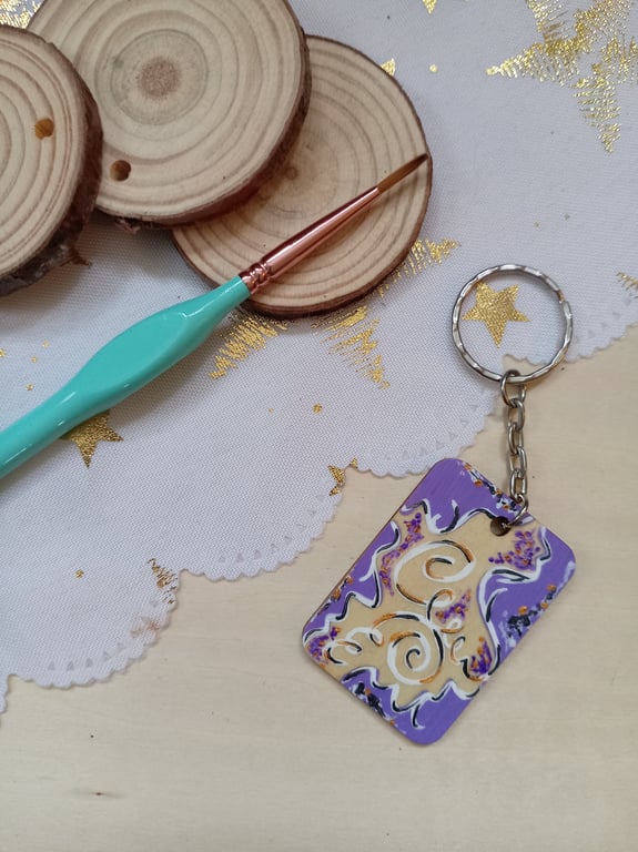 Wooden rectangular purple and white spiral keyring 