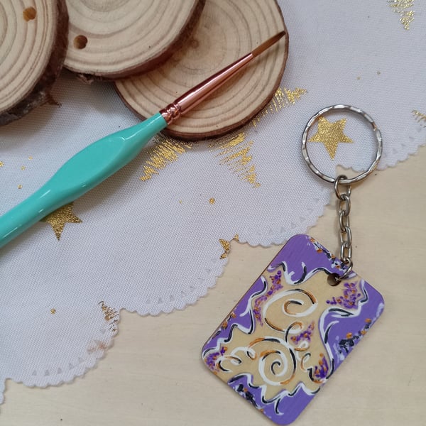 Wooden rectangular purple and white spiral keyring 