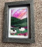 Sheep on a hill on the moors pink sunset   needle felt black frame 