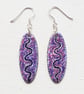 Oval Earrings with wavy line design - Image 7