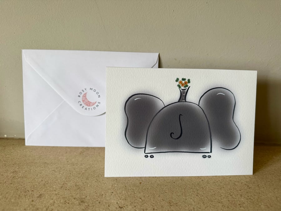 February Birthday Card, Primrose and Elephant. 