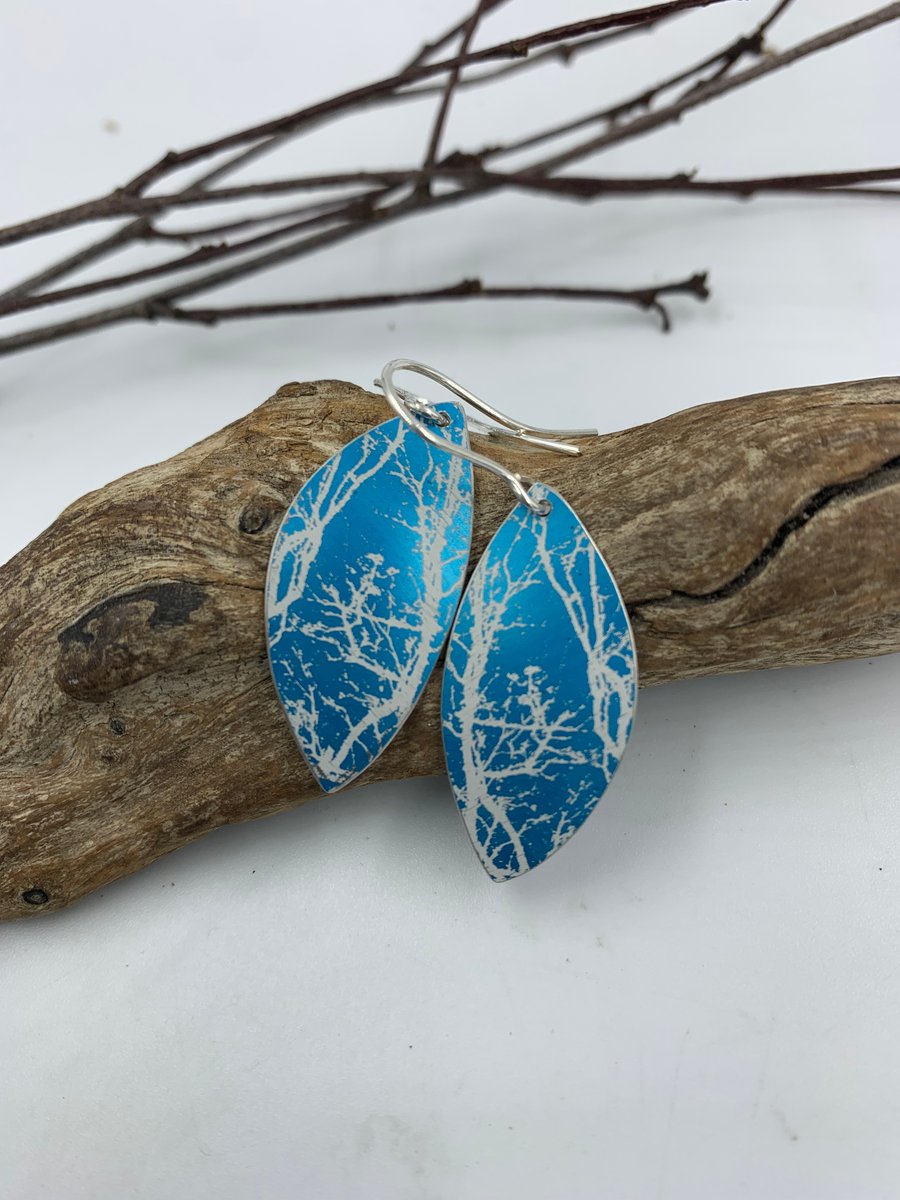 Turquoise aluminium winter tree earrings.