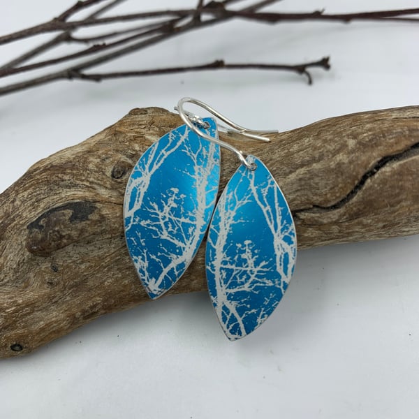 Turquoise aluminium winter tree earrings.