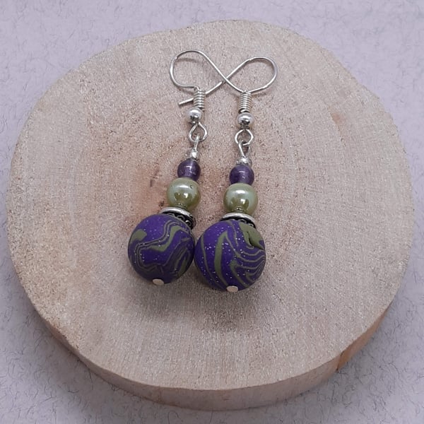 Dangly earrings in sage green and purple