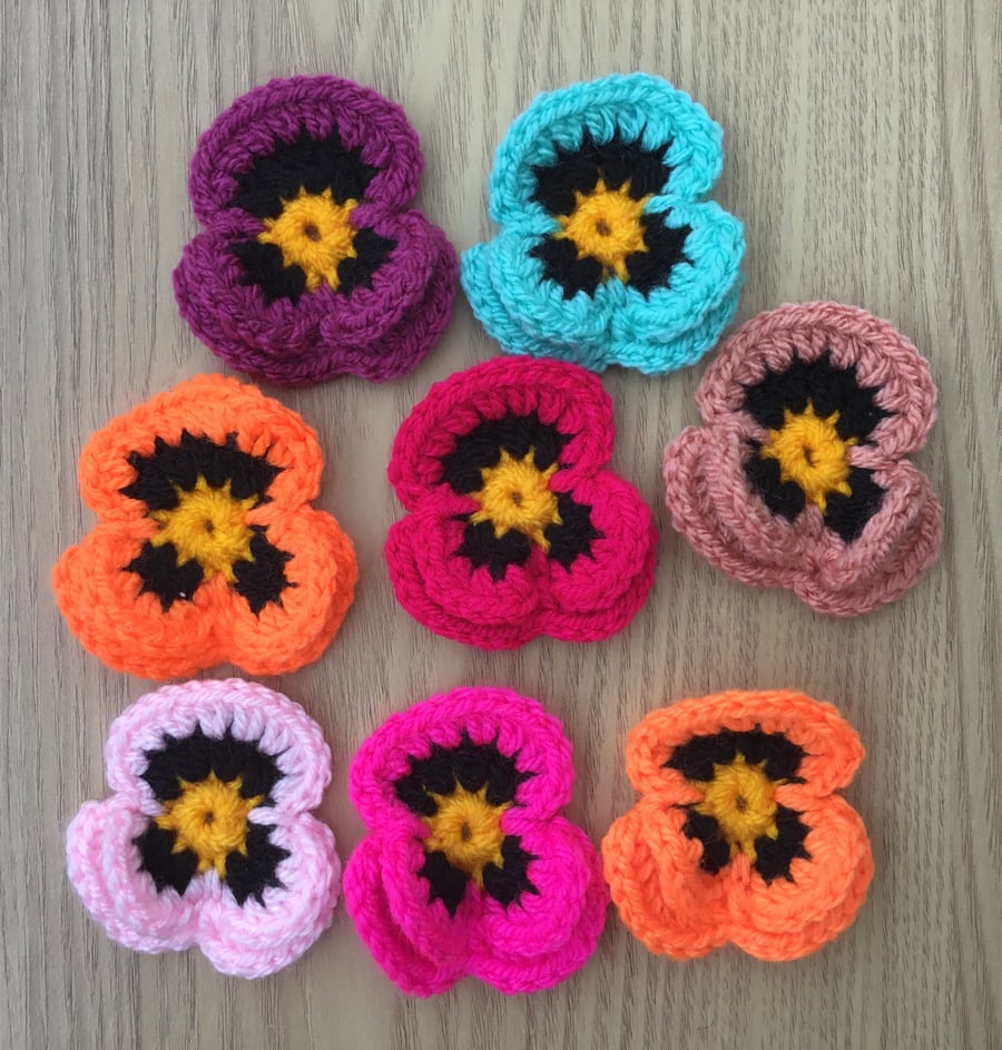 8 Colourful Crocheted Pansy Flowers to add to Crafting Projects.