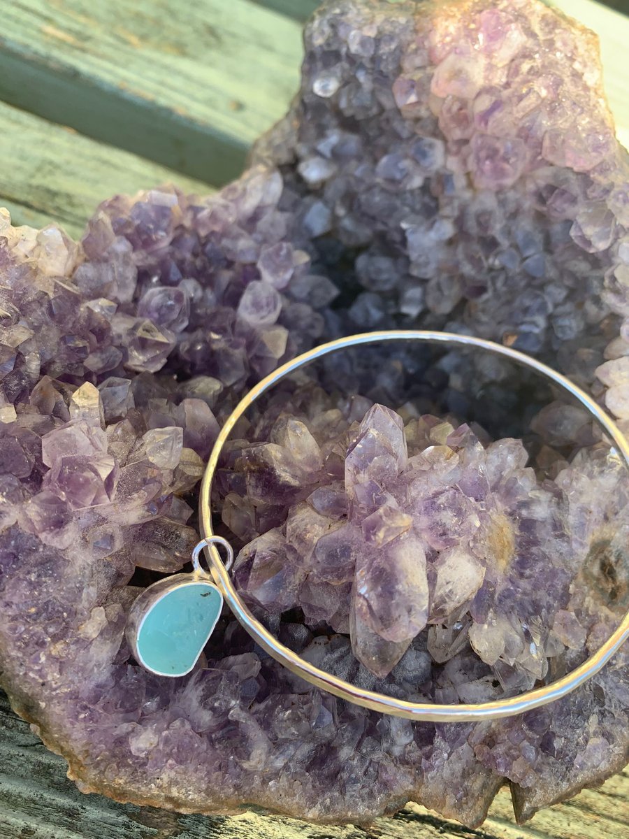 Light blue sea glass charm on bangle with sterling silver