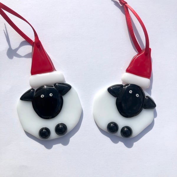A unique fused glass sheep wearing Santa hat  Christmas tree decorations 