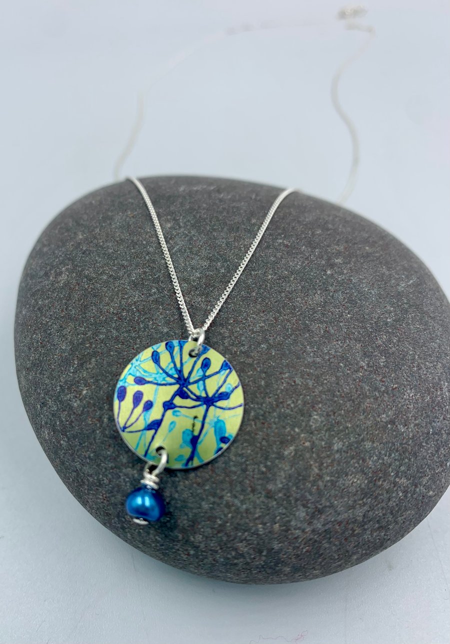Lime green and blue aluminium cow parsley circle pendant with pearl 
