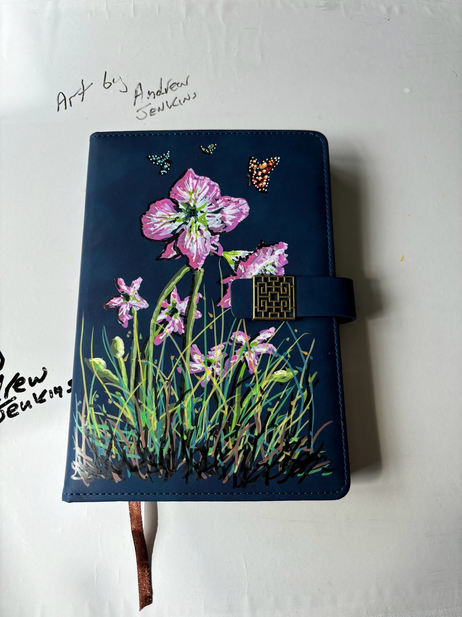 A hand painted and sealed faux leather journal by Andrew Jenkins 