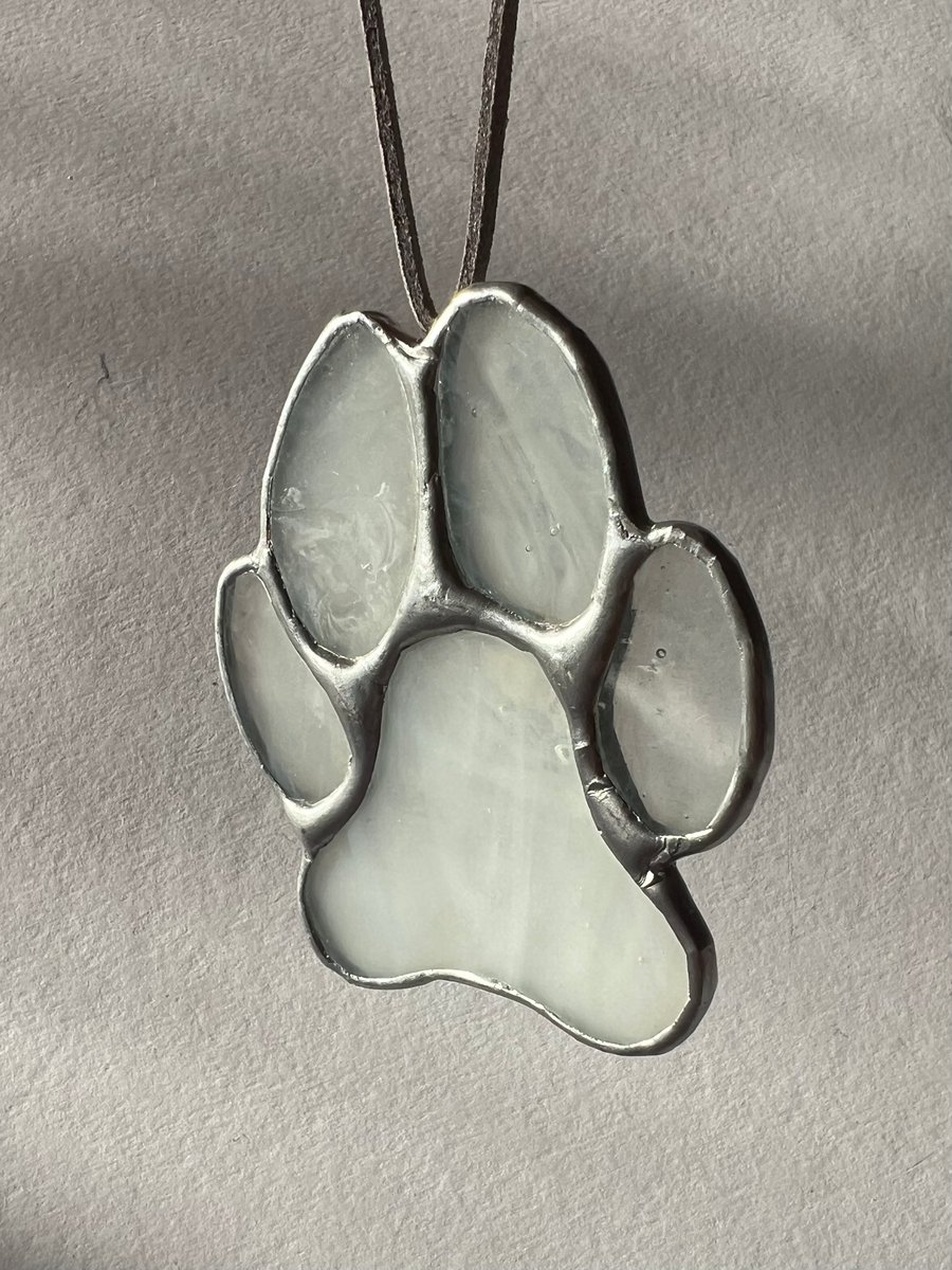 Wispy white stained glass dog paw decoration - pet commemoration