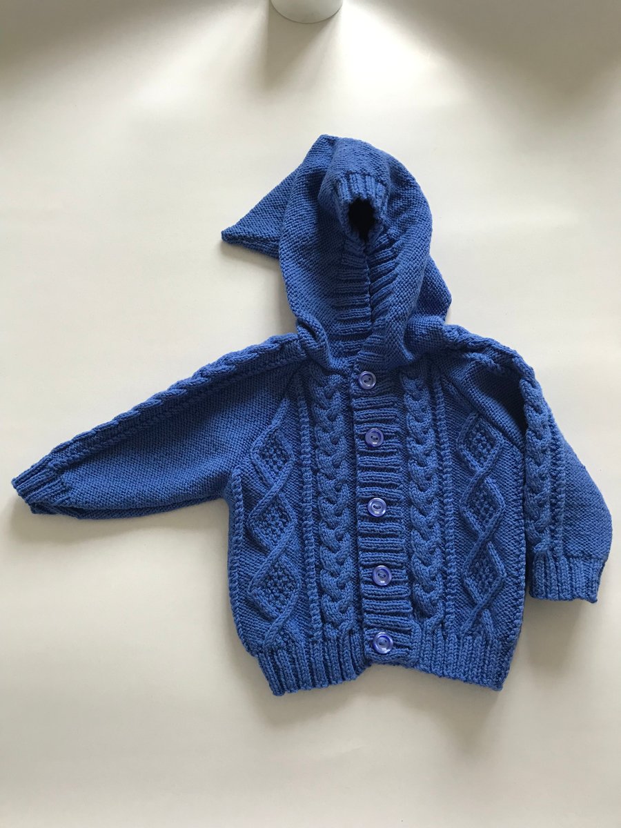Hand kniited baby jacket with hood