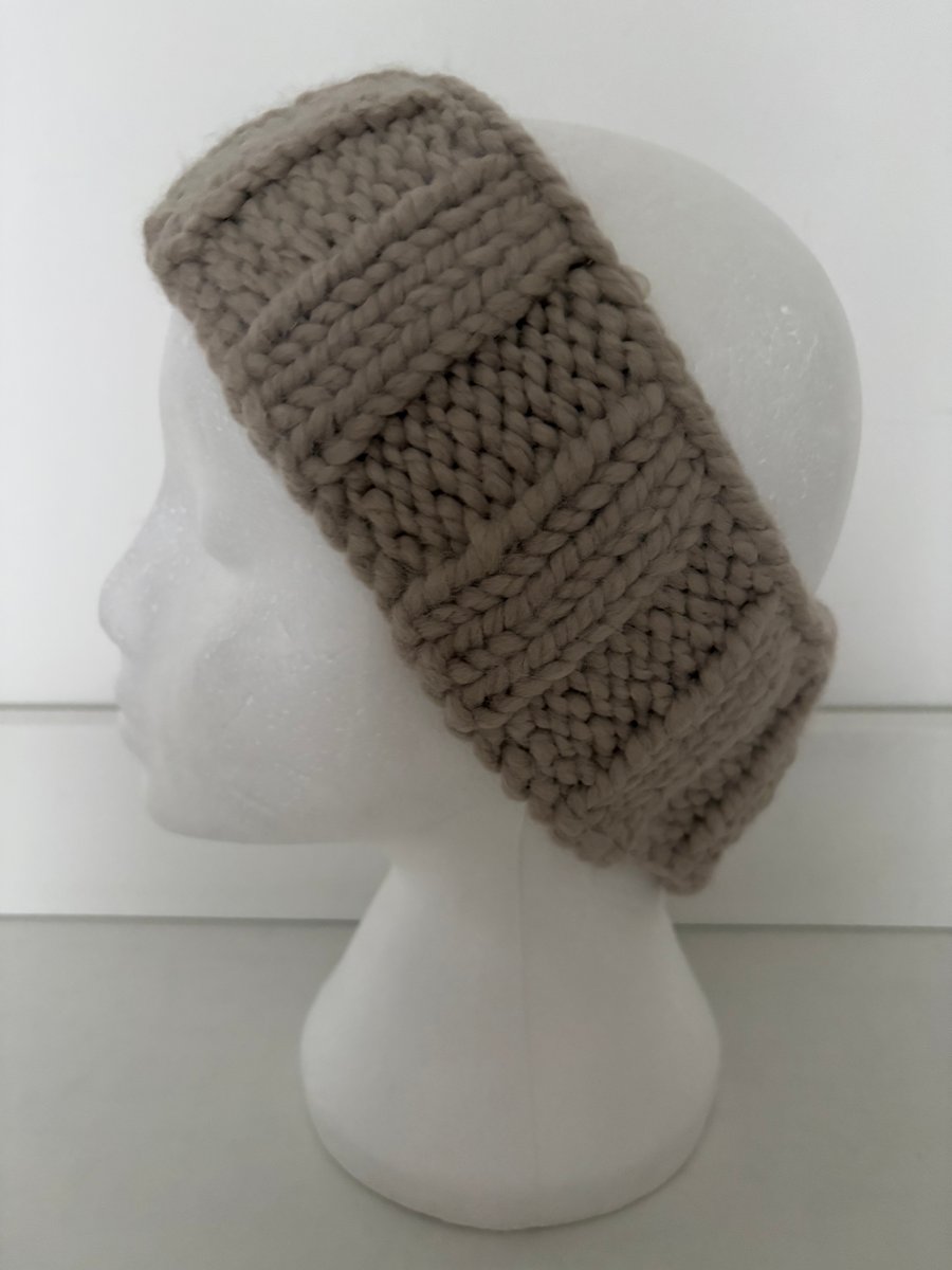 Hand knitted headband. 