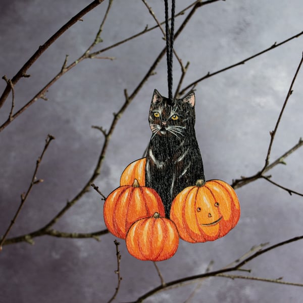 Black cat with pumpkins Halloween decoration  