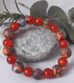 Orange multi coloured polymer clay stretch beaded bracelet