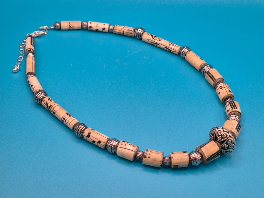 Gorgeous necklace made with recycled music sheets