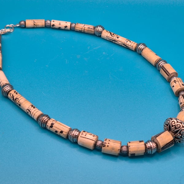 Gorgeous necklace made with recycled music sheets