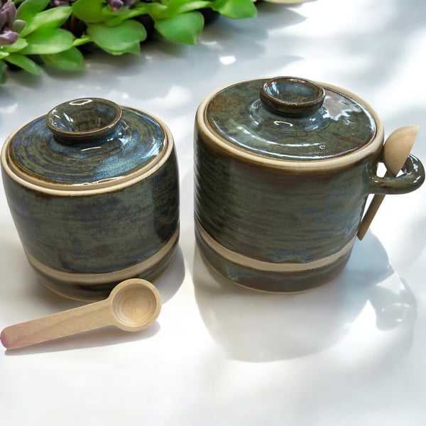 Hand crafted stoneware lidded pots complete with little wooden spoon.