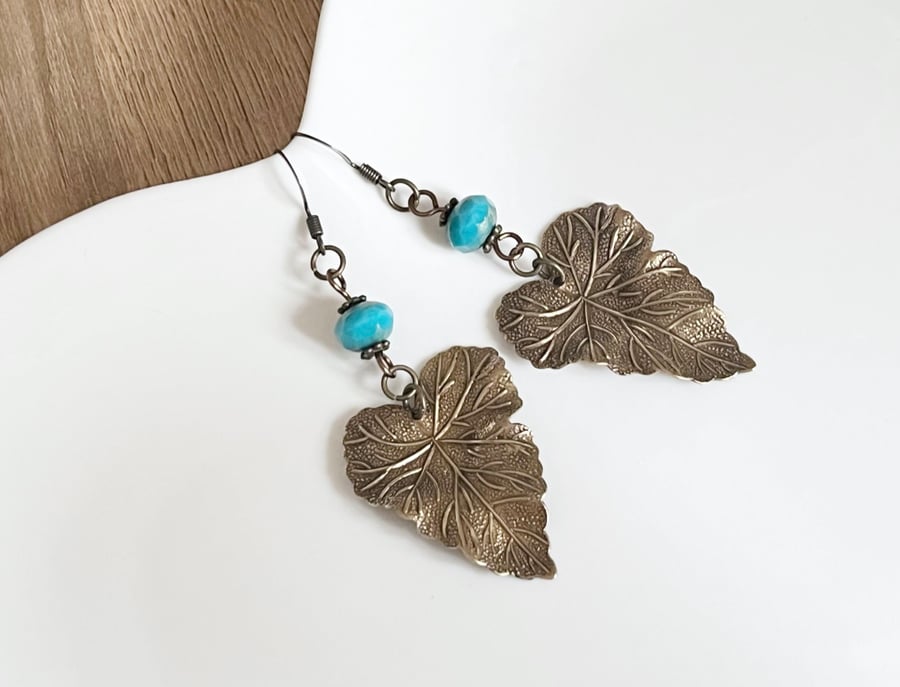 Bohemian brass leaf earrings with aqua blue Czech glass beads