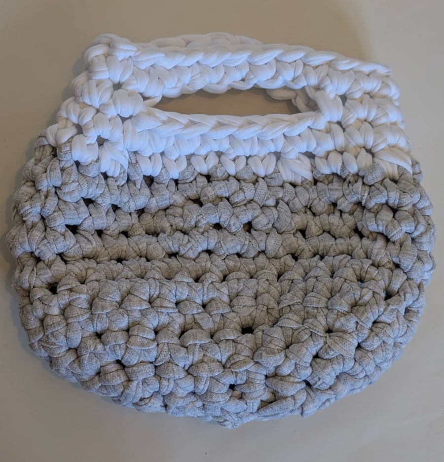 Handmade crochet bag made with grey and white t-shirt yarn 