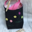 Cross-body peg bag. Repurposed black denim with floral decoration