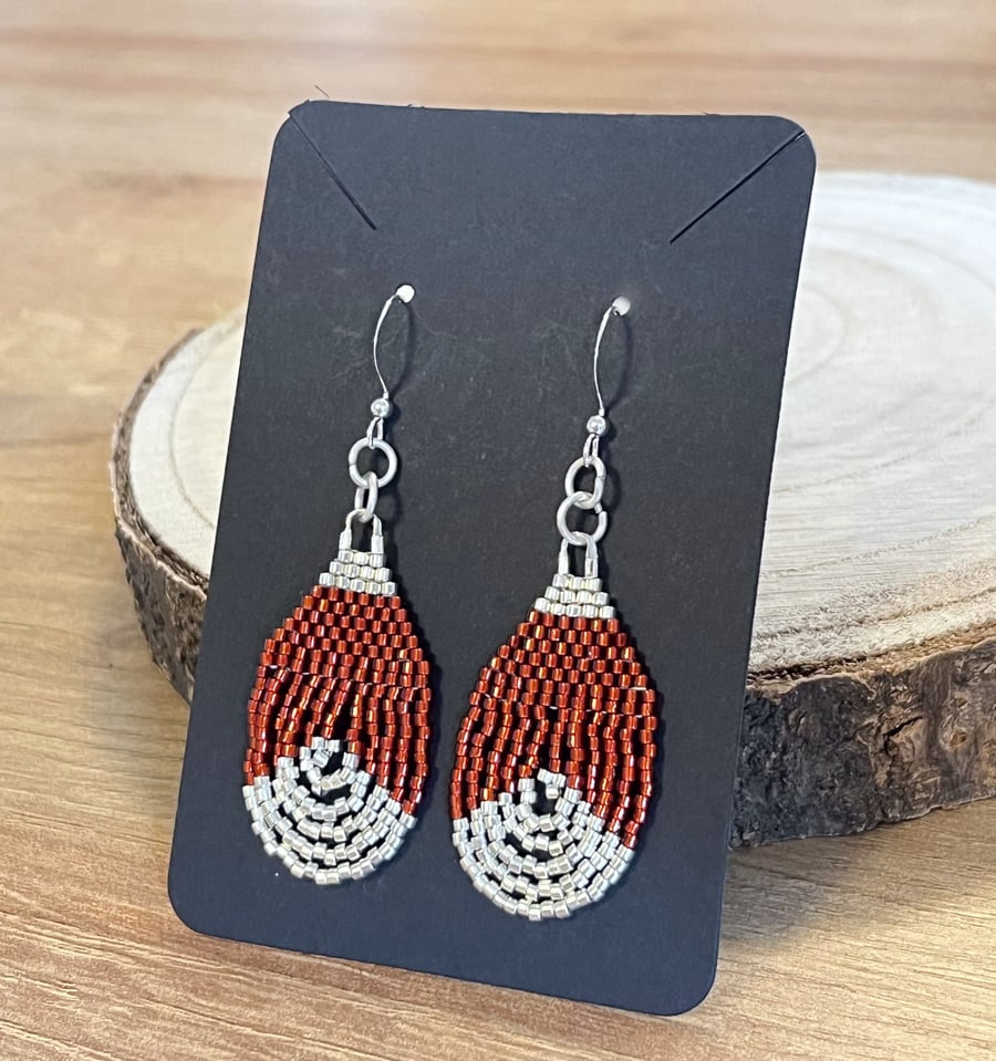 Beadwork teardrop earrings in shiny maroon red and silver