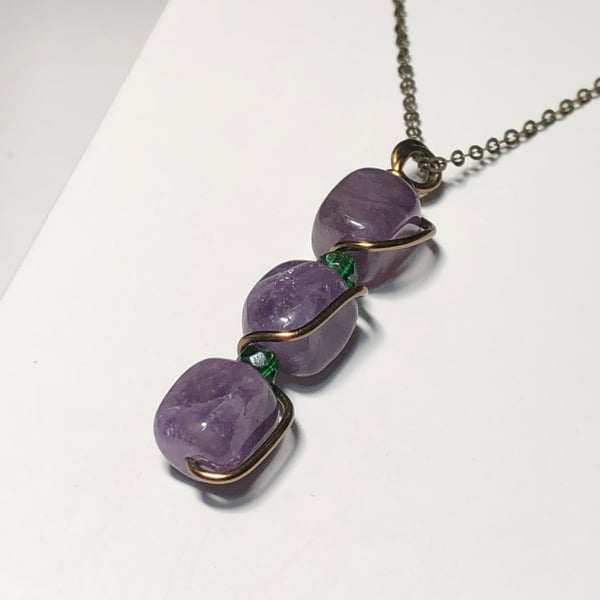 Amethyst and Emerald wire twist necklace