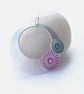 Circle pendant in brushed aluminium with pink and turquoise discs - Image 3