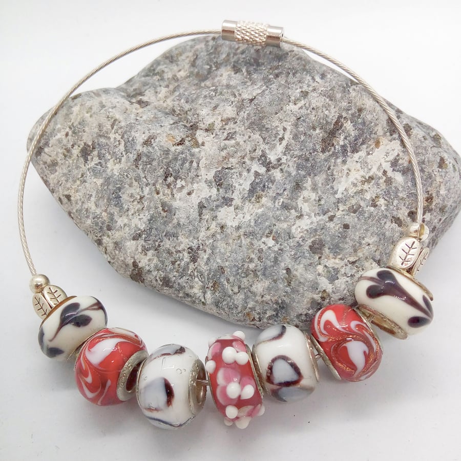 Red and White European Lampwork Bead Bracelet on a Memory Wire Band