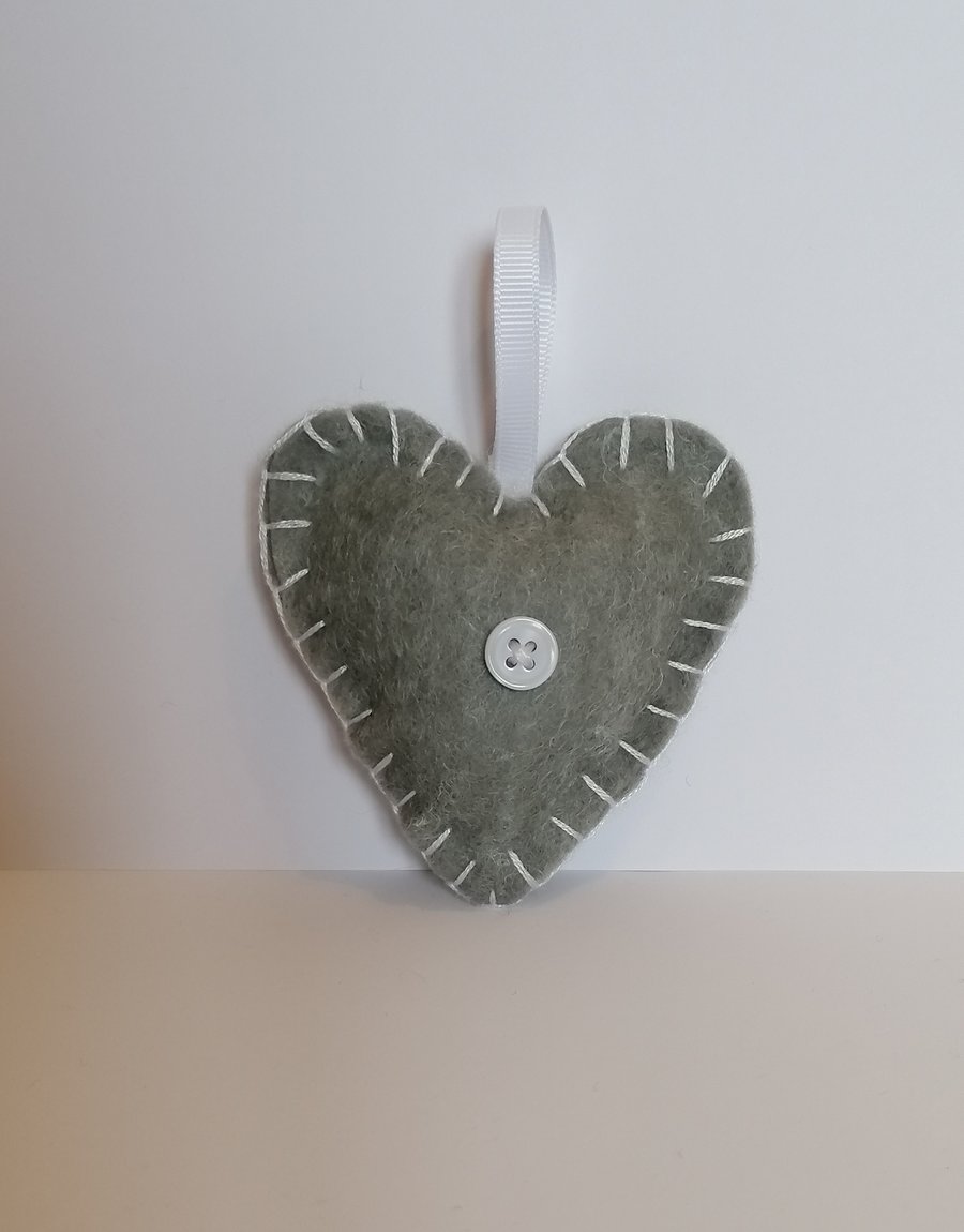 Handmade grey felt heart with white stitching, ribbon and button 