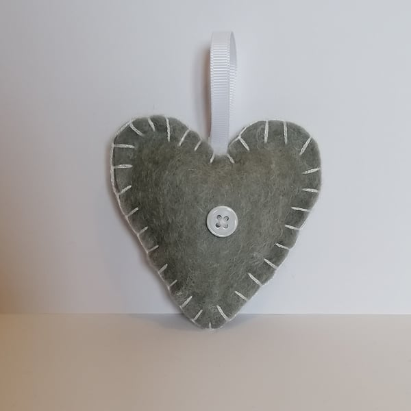 Handmade grey felt heart with white stitching, ribbon and button 