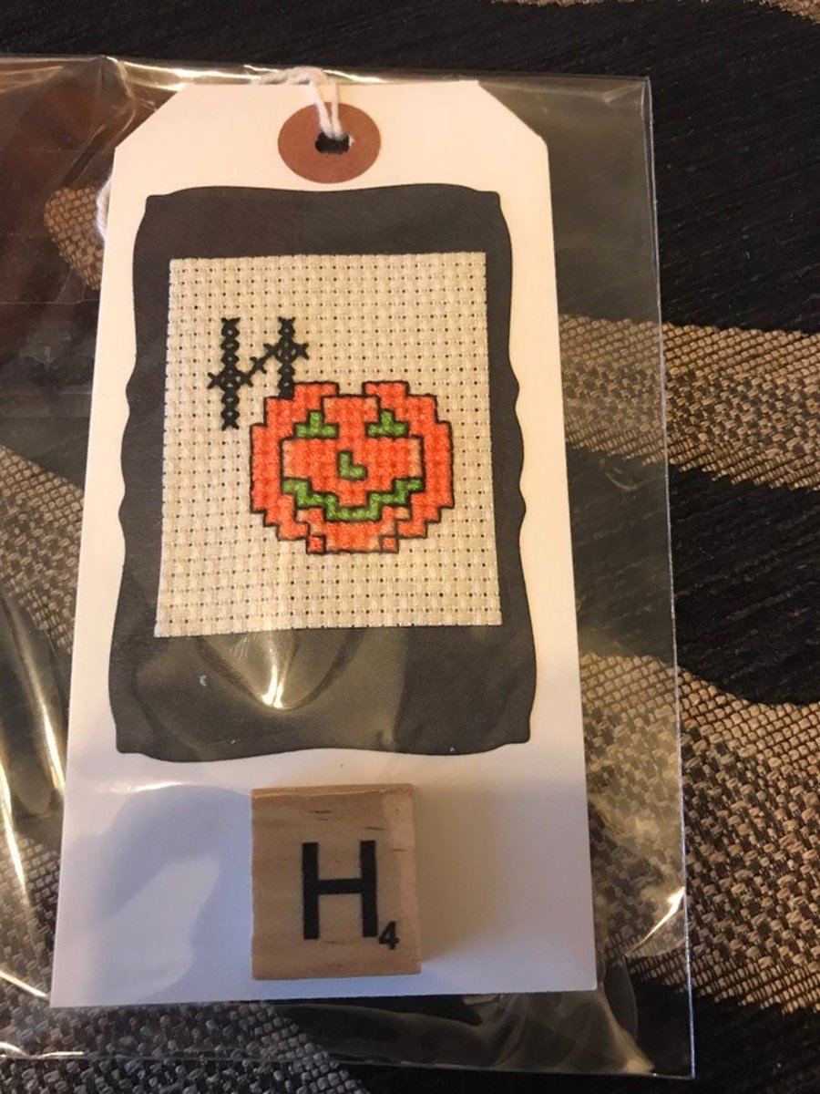 Cross stitched letter H Halloween gift tag