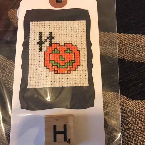 Cross stitched letter H Halloween gift tag