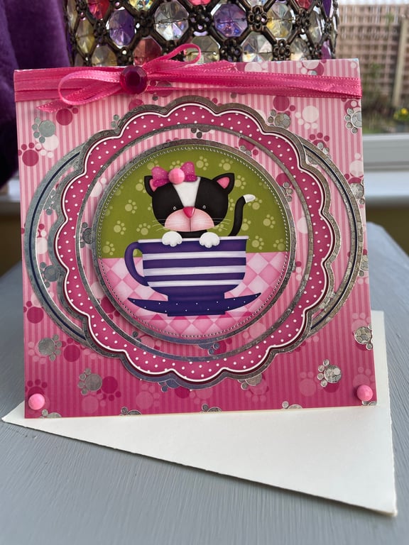 Cute kitten in a teacup birthday card