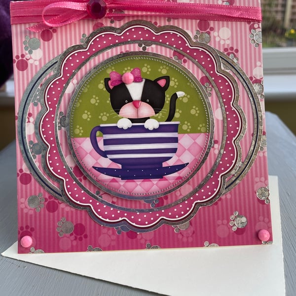 Cute kitten in a teacup birthday card