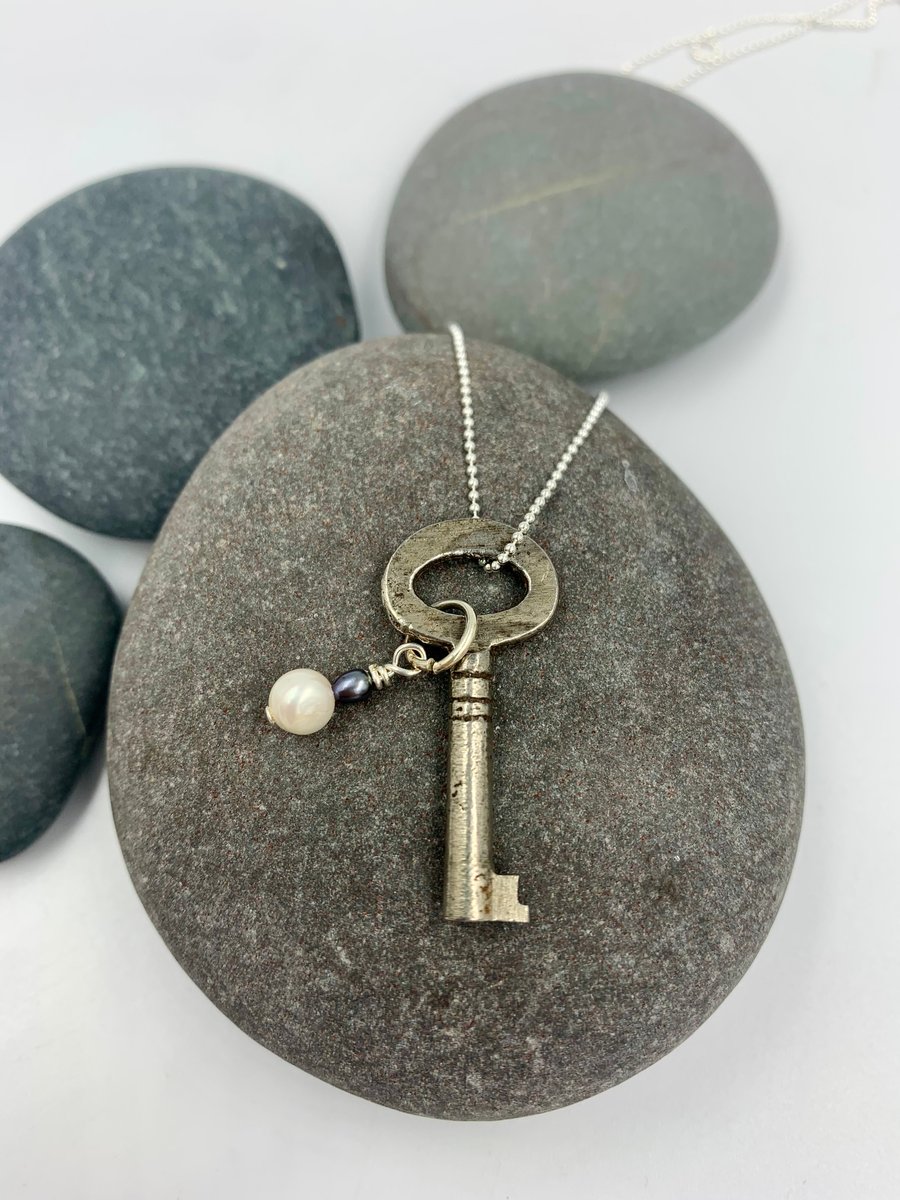 Vintage key pendant with freshwater pearls on a silver chain