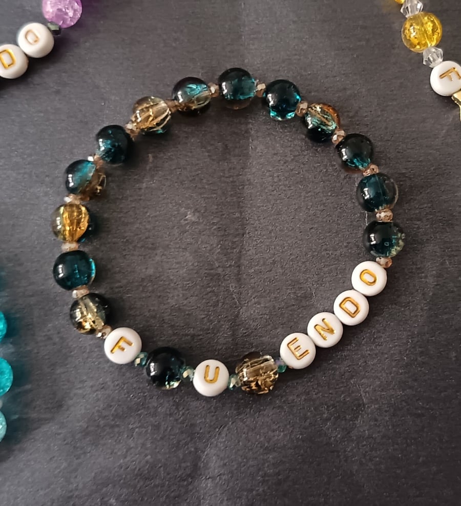 Elasticated blue beaded endometriosis bracelet